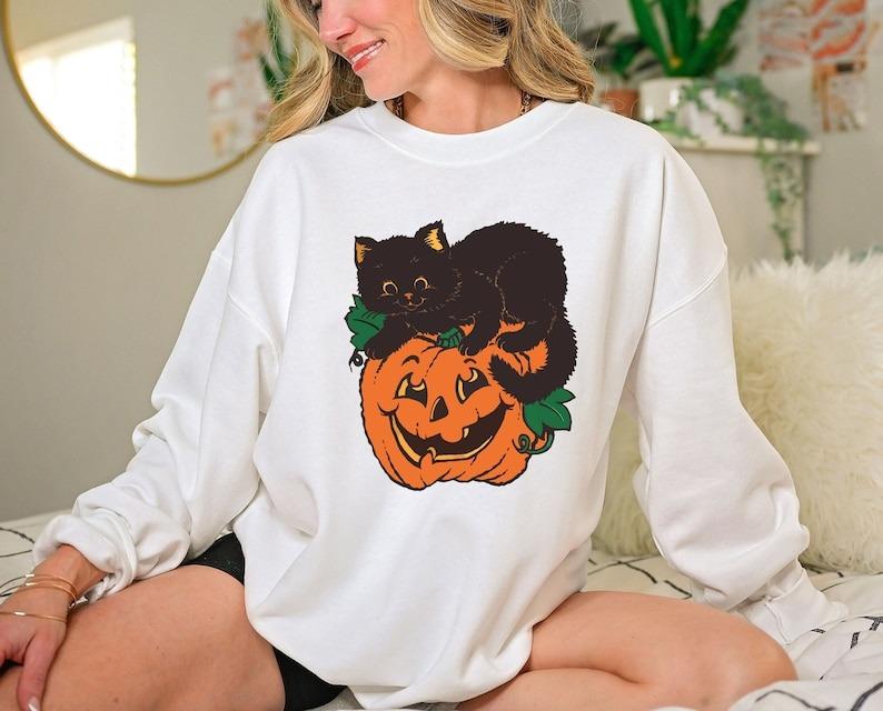 Sudadera de Halloween con calabaza y gato negro 